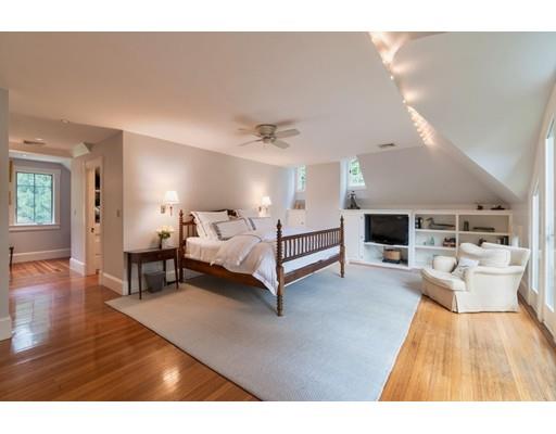 204 Nashawtuc Road Concord, MA 01742 - Photo 15 of 30 a living room with furniture and a wooden floor