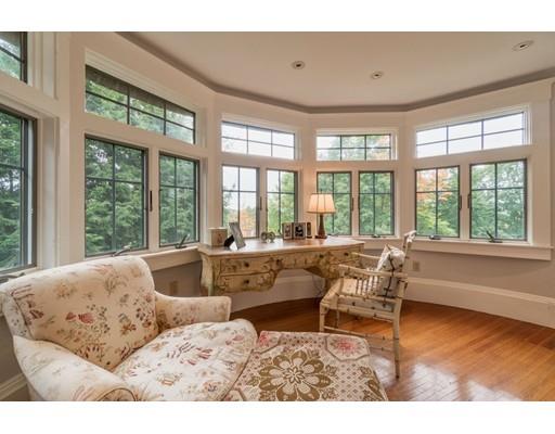 204 Nashawtuc Road Concord, MA 01742 - Photo 18 of 30 a living room with furniture and large windows