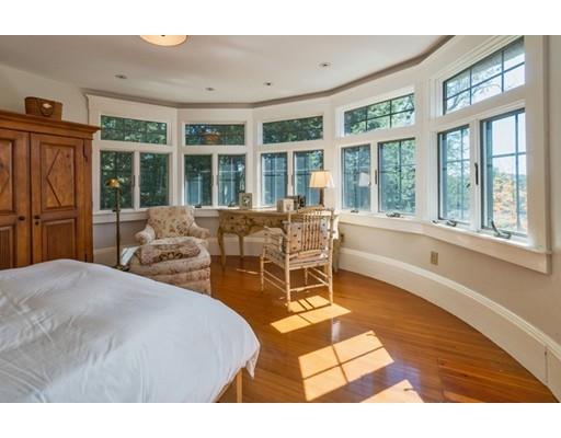 204 Nashawtuc Road Concord, MA 01742 - Photo 19 of 30 a living room with furniture and a large window
