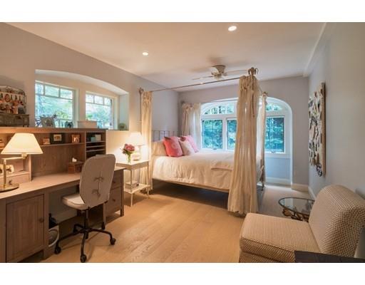 204 Nashawtuc Road Concord, MA 01742 - Photo 23 of 30 a bedroom with furniture and a large window
