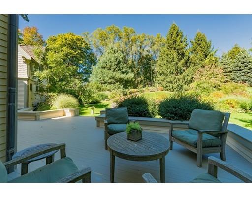 204 Nashawtuc Road Concord, MA 01742 - Photo 26 of 30 a view of a chairs and table in a patio
