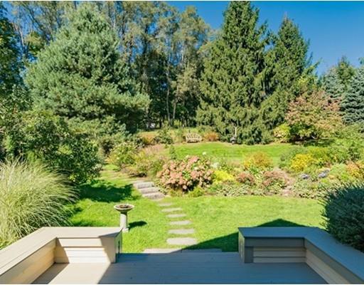 204 Nashawtuc Road Concord, MA 01742 - Photo 27 of 30 a view of a yard with an outdoor seating
