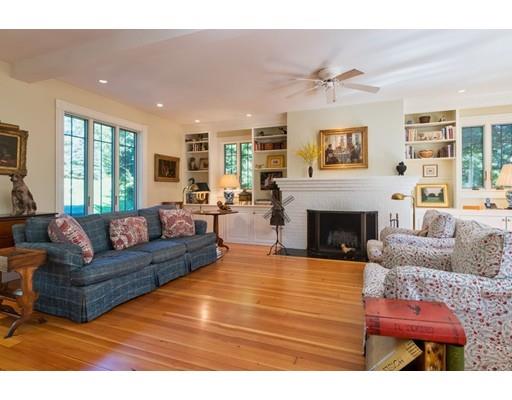 204 Nashawtuc Road Concord, MA 01742 - Photo 4 of 30 a living room with furniture fireplace and window
