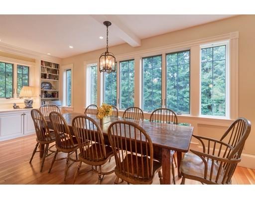 204 Nashawtuc Road Concord, MA 01742 - Photo 5 of 30 a view of a dining room with furniture window and outside view