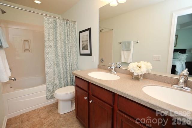 1098 Drayton Court Fort Mill, SC 29708 - Photo 11 of 16 a bathroom with a granite countertop sink toilet and shower
