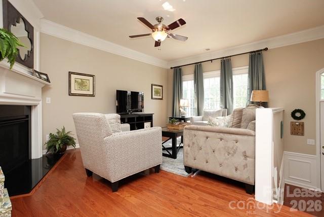 1098 Drayton Court Fort Mill, SC 29708 - Photo 2 of 16 a living room with furniture and a flat screen tv