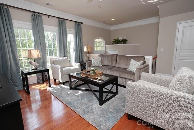 1098 Drayton Court Fort Mill, SC 29708 - Photo 3 of 16 a living room with furniture and a table