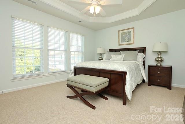 1098 Drayton Court Fort Mill, SC 29708 - Photo 9 of 16 a bedroom with a bed and a chandelier