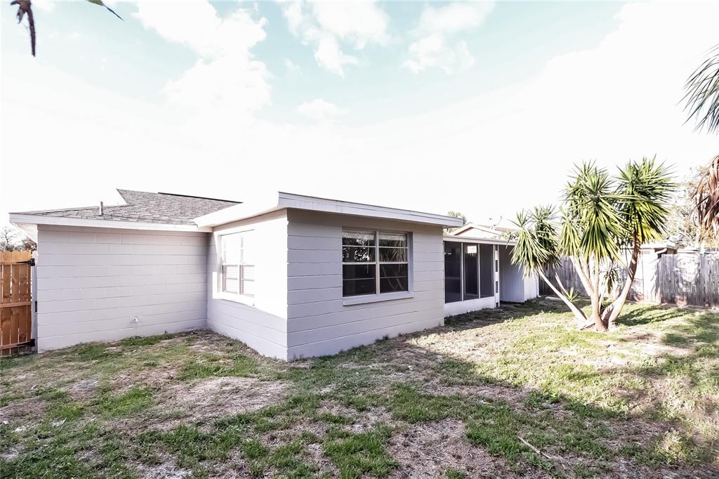 6230 Westport Drive Port Richey, FL 34668 - Photo 14 of 15 a view of a backyard