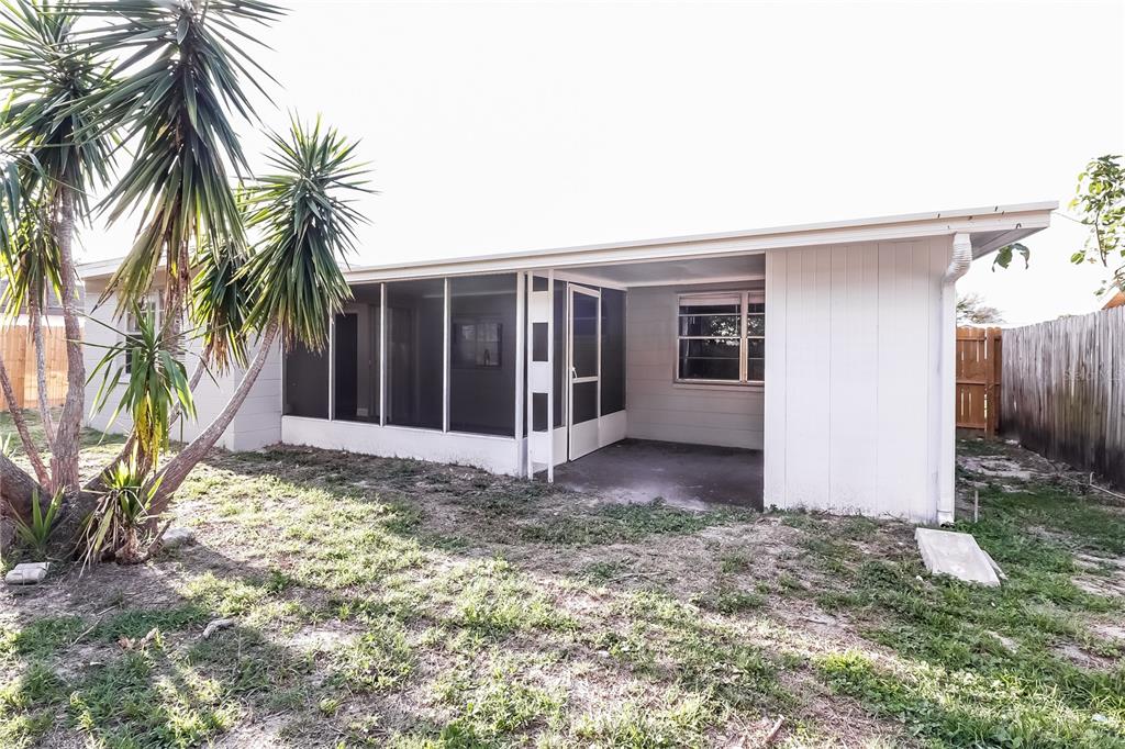 6230 Westport Drive Port Richey, FL 34668 - Photo 15 of 15 a view of a house with a yard