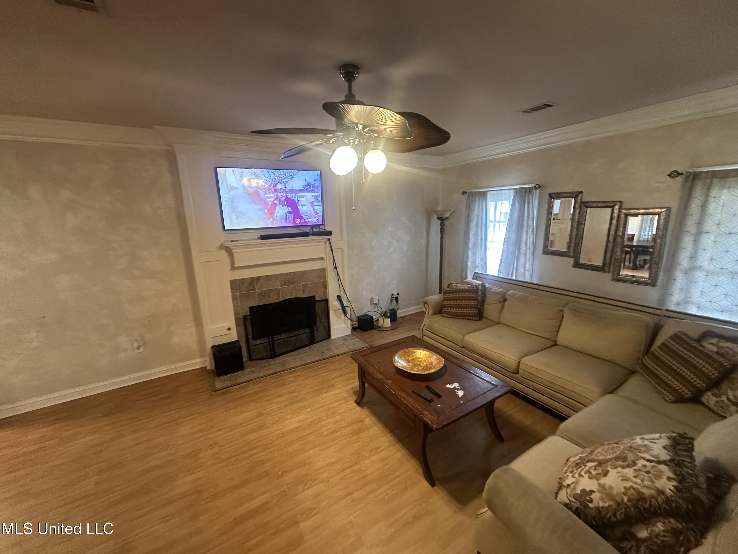 713 Hawthorn Green Drive Ridgeland, MS 39157 - Photo 15 of 17 Family Room Fireplace