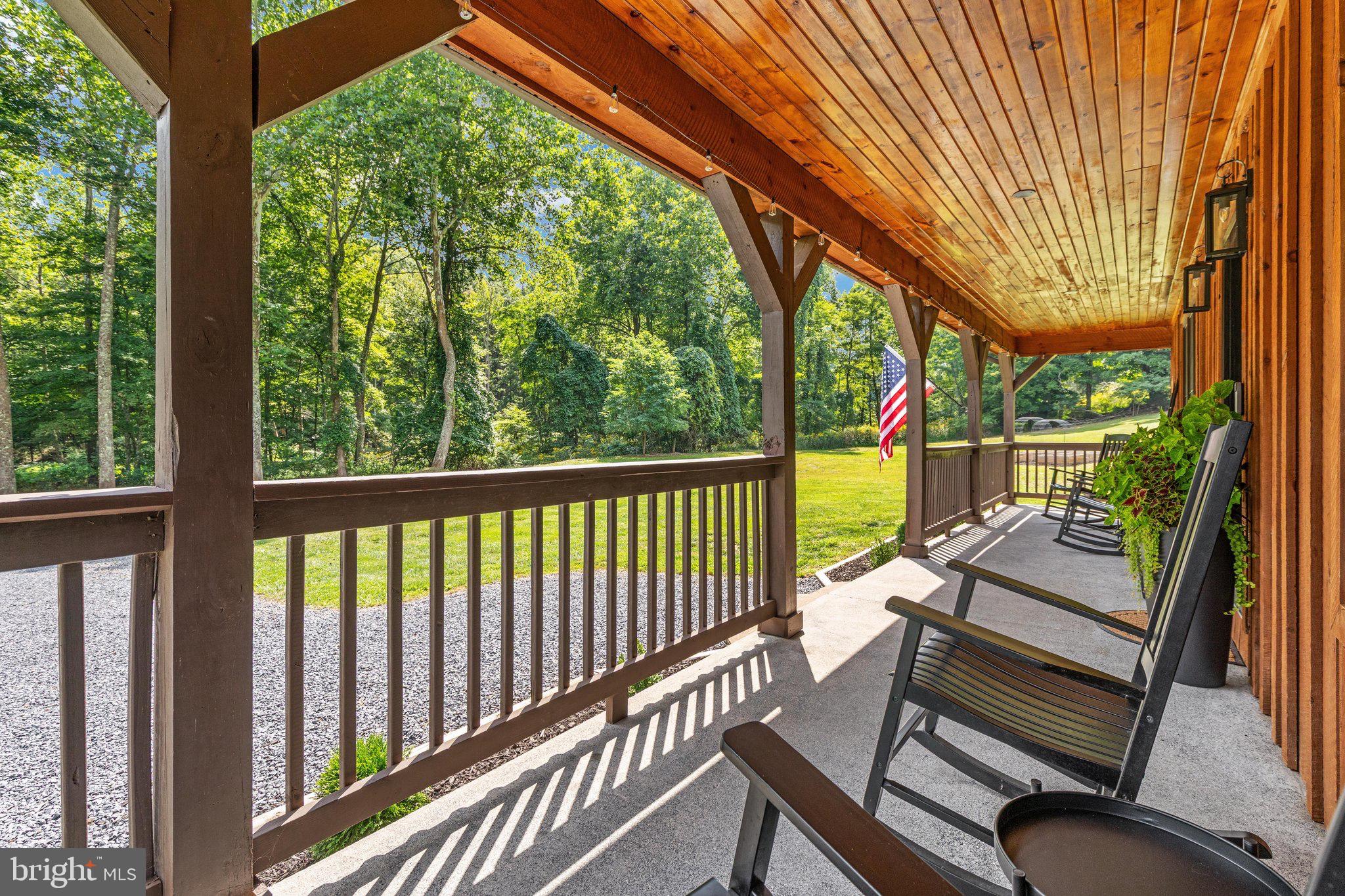1396 Cullers Run Road Mathias, WV 26812 - Photo 40 of 79 Charming porch with serene woodland views.