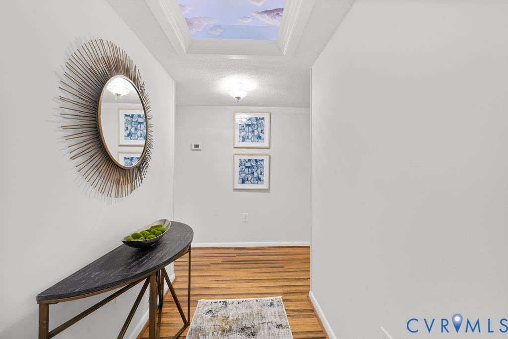 2956 Hathaway Road, Unit U704 Richmond, VA 23225 - Photo 2 of 42 Hallway featuring wood-finish flooring, white wall