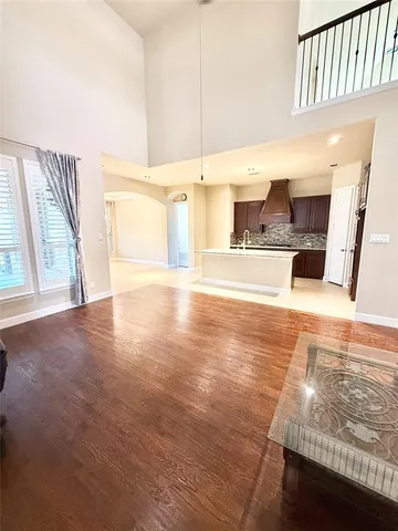 a view of a living room with a fireplace