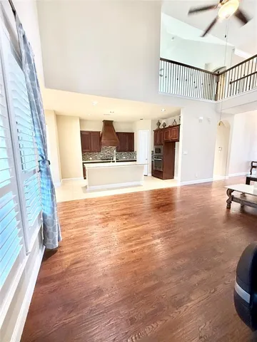 a view of a living room and hardwood floor