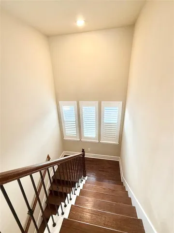 a view of hallway with stairs