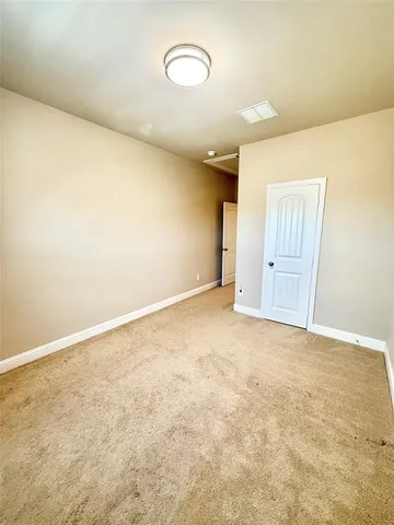 an empty room with a natural light