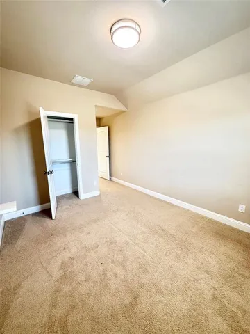 a view of a balcony with chairs