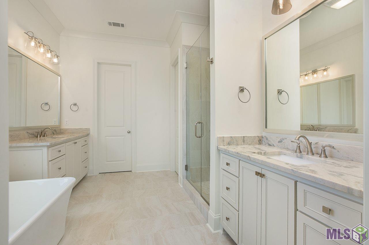 409 Glenthorne Drive Gonzales, LA 70737 - Photo 11 of 22 A previous built home with same floor plan...plan and finishes are subject to change