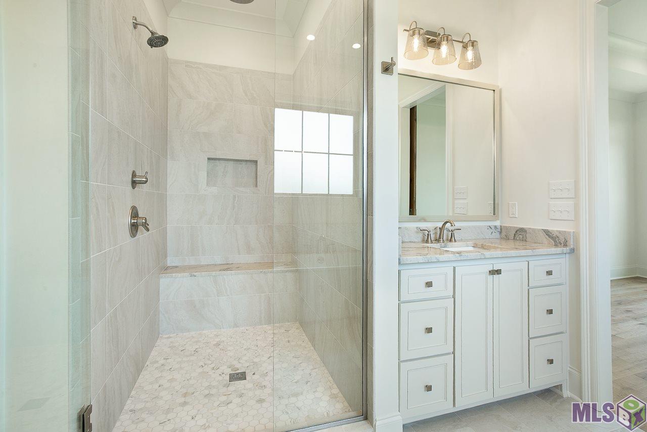 409 Glenthorne Drive Gonzales, LA 70737 - Photo 12 of 22 A previous built home with same floor plan...plan and finishes are subject to change