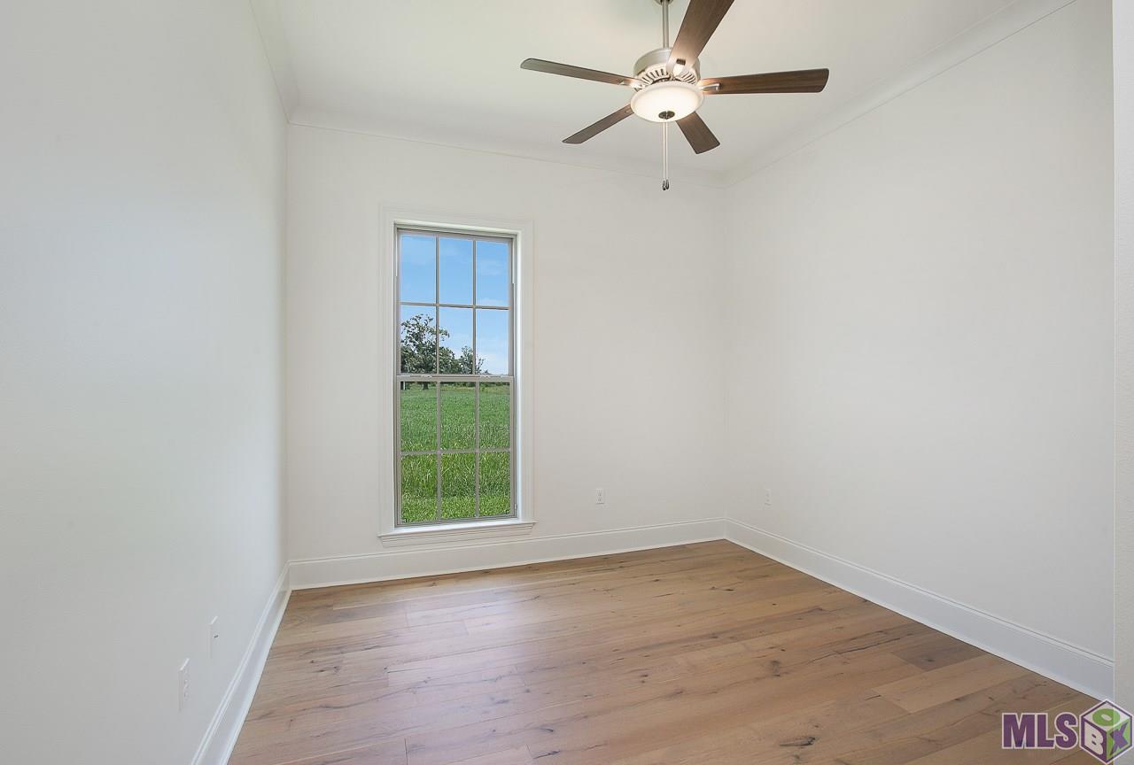 409 Glenthorne Drive Gonzales, LA 70737 - Photo 14 of 22 A previous built home with same floor plan...plan and finishes are subject to change