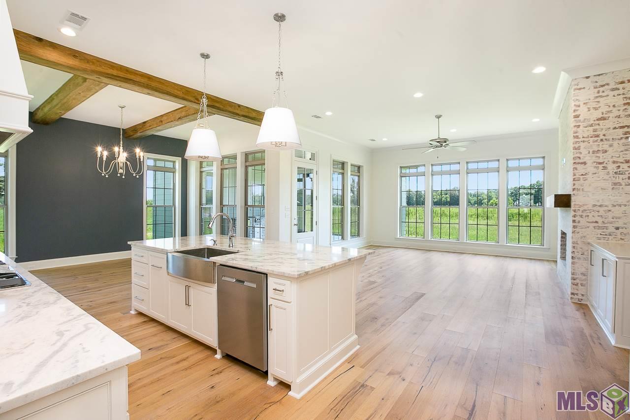 409 Glenthorne Drive Gonzales, LA 70737 - Photo 5 of 22 A previous built home with same floor plan...plan and finishes are subject to change