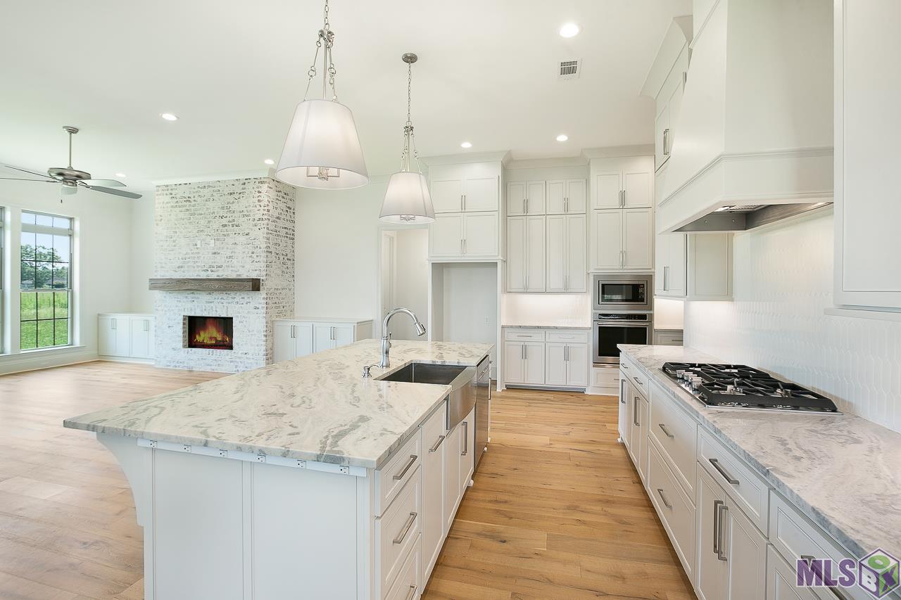 409 Glenthorne Drive Gonzales, LA 70737 - Photo 6 of 22 A previous built home with same floor plan...plan and finishes are subject to change