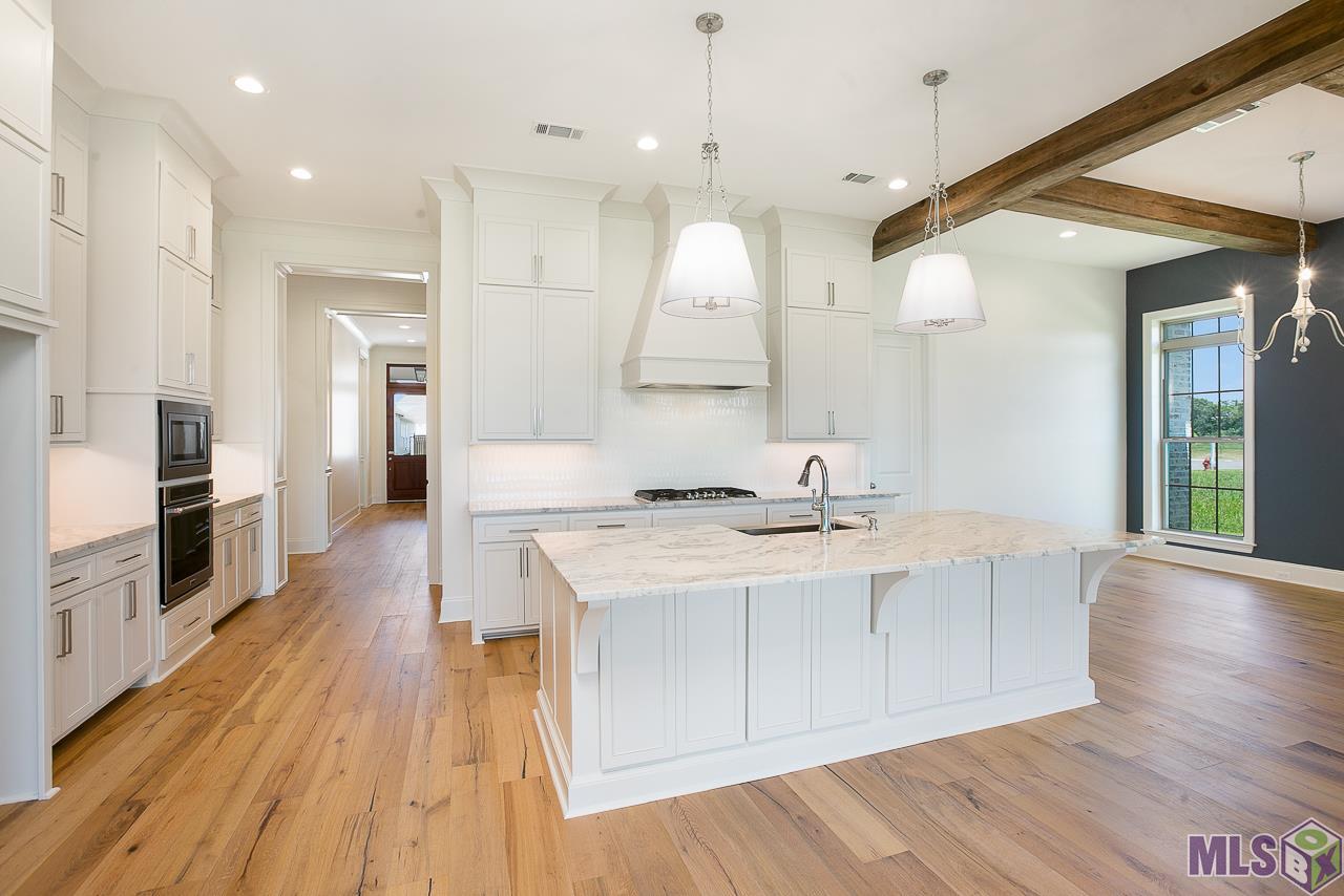 409 Glenthorne Drive Gonzales, LA 70737 - Photo 7 of 22 A previous built home with same floor plan...plan and finishes are subject to change