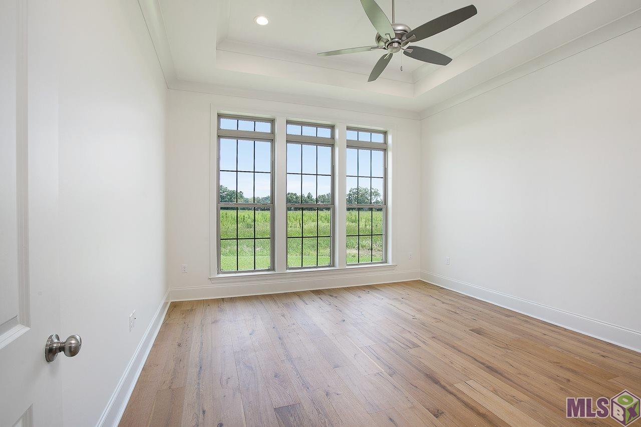 409 Glenthorne Drive Gonzales, LA 70737 - Photo 9 of 22 A previous built home with same floor plan...plan and finishes are subject to change