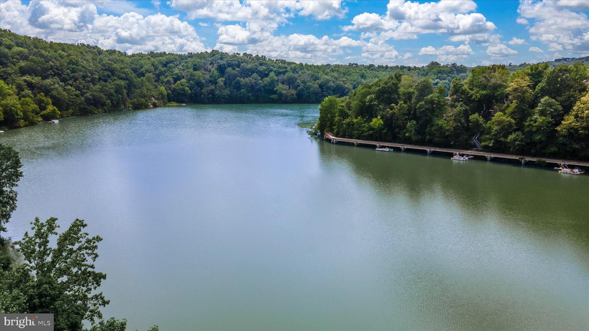 7091 Kokanee Way New Market, MD 21774 - Photo 54 of 69 a view of a lake with a outdoor space