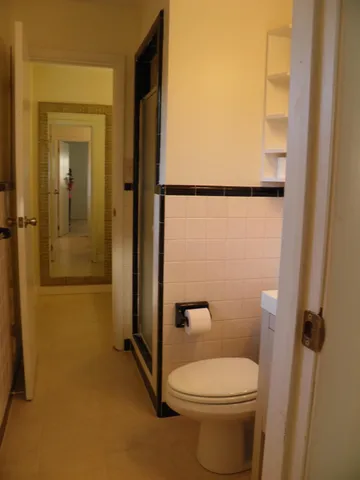 a bathroom with a sink vanity and a mirror