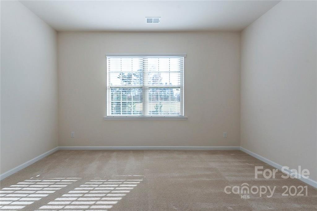 541 Dulaney Drive Fort Mill, SC 29708 - Photo 12 of 16 an empty room with a window