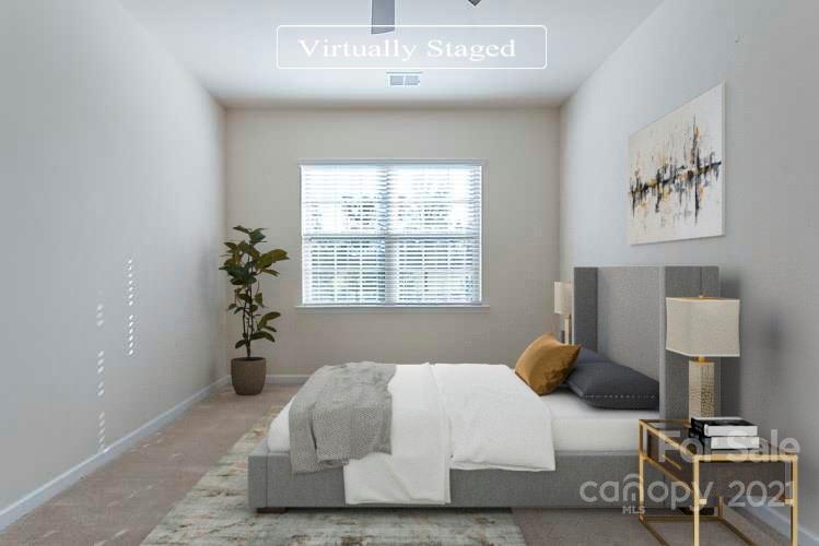 541 Dulaney Drive Fort Mill, SC 29708 - Photo 3 of 16 a bedroom with a bed and a window