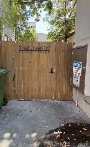 a view of a backyard of the house