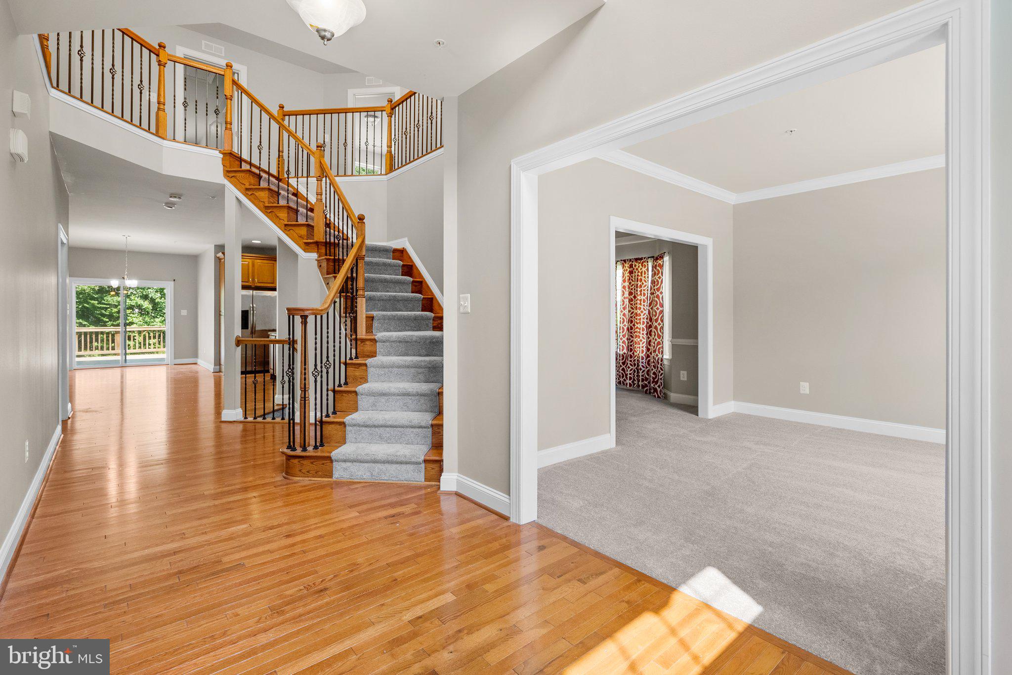 9602 Pep Rally Lane Waldorf, MD 20603 - Photo 2 of 44 a view of entryway and hall with wooden floor