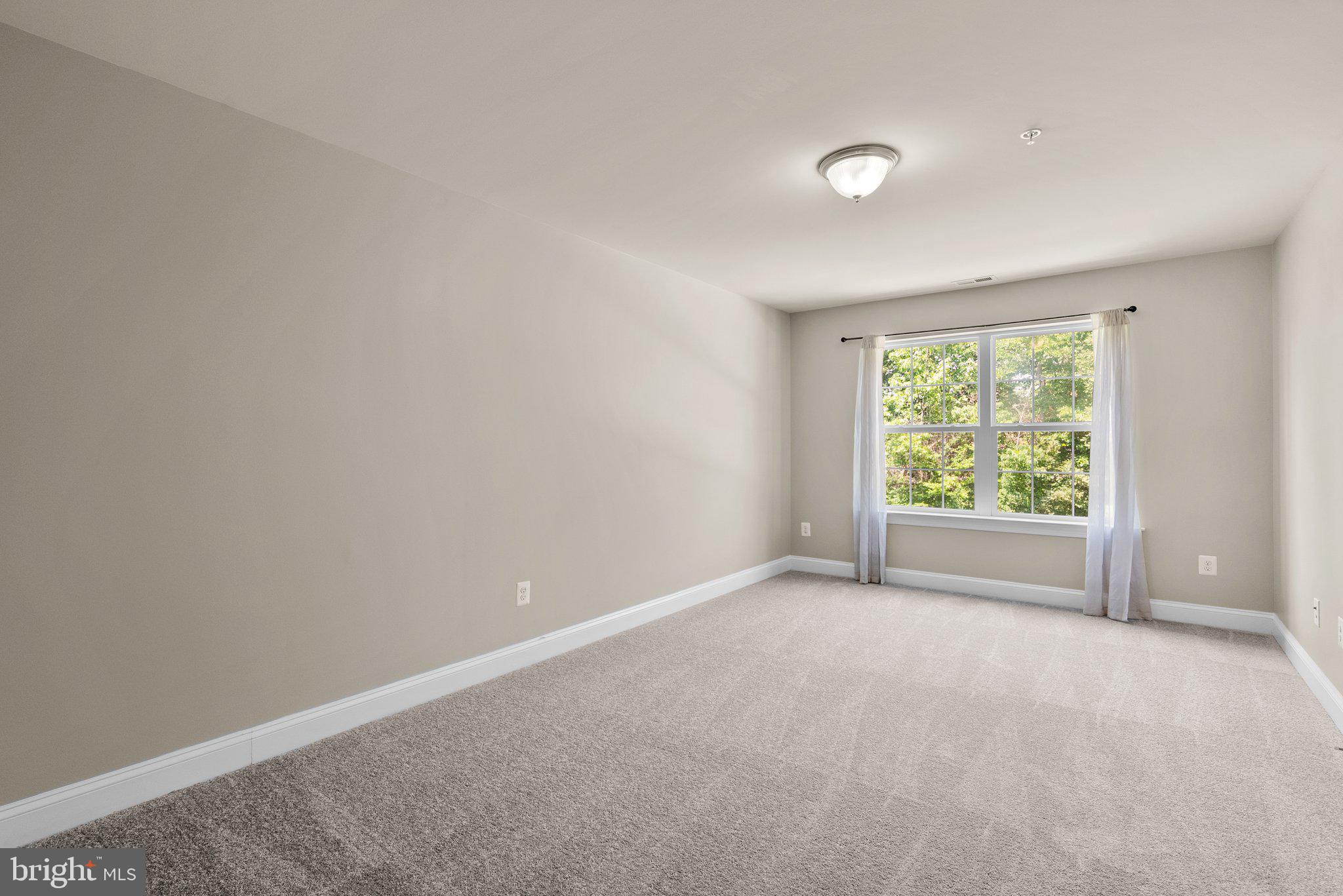 9602 Pep Rally Lane Waldorf, MD 20603 - Photo 29 of 44 a view of an empty room with a window