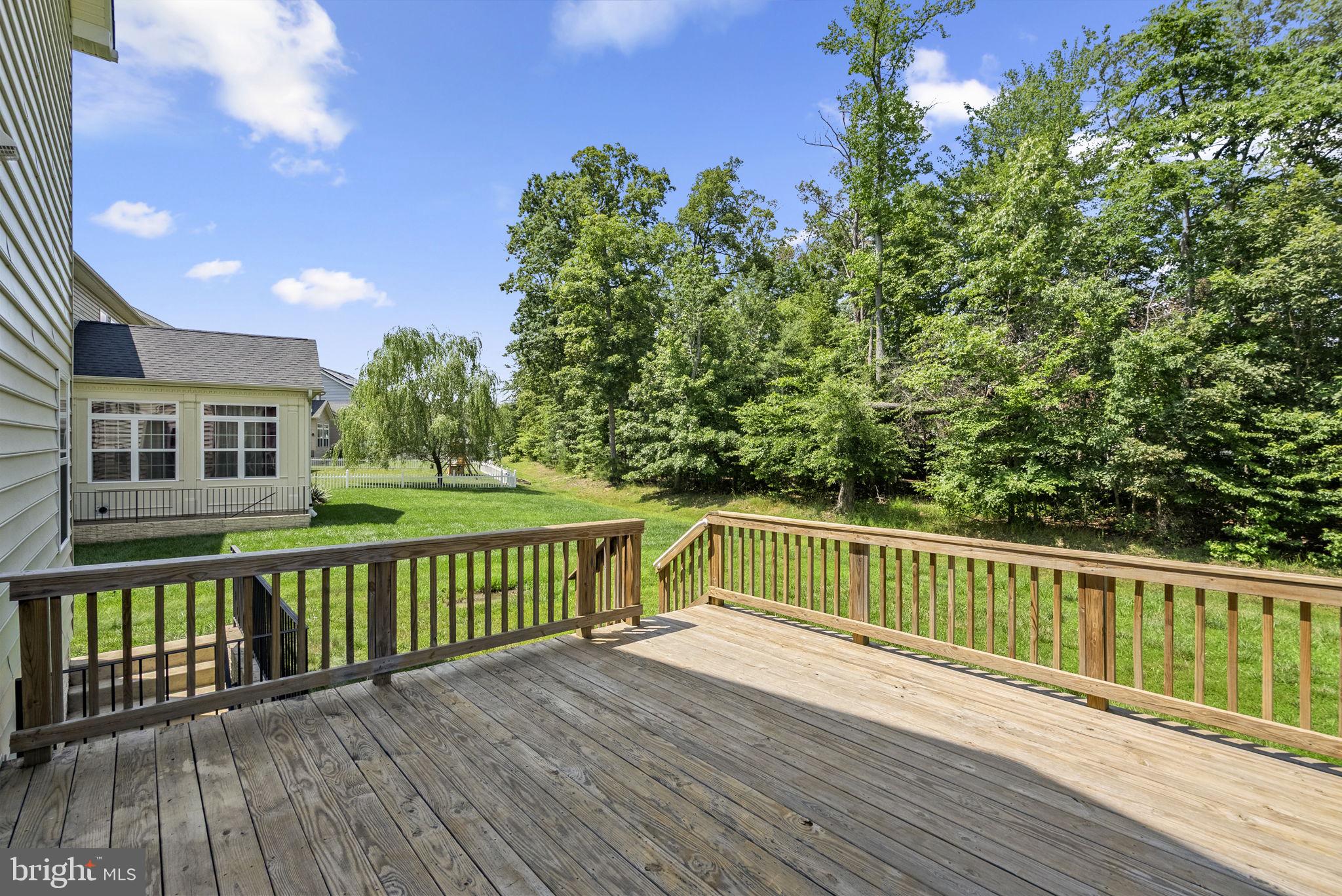 9602 Pep Rally Lane Waldorf, MD 20603 - Photo 44 of 44 a view of a wooden deck with a yard