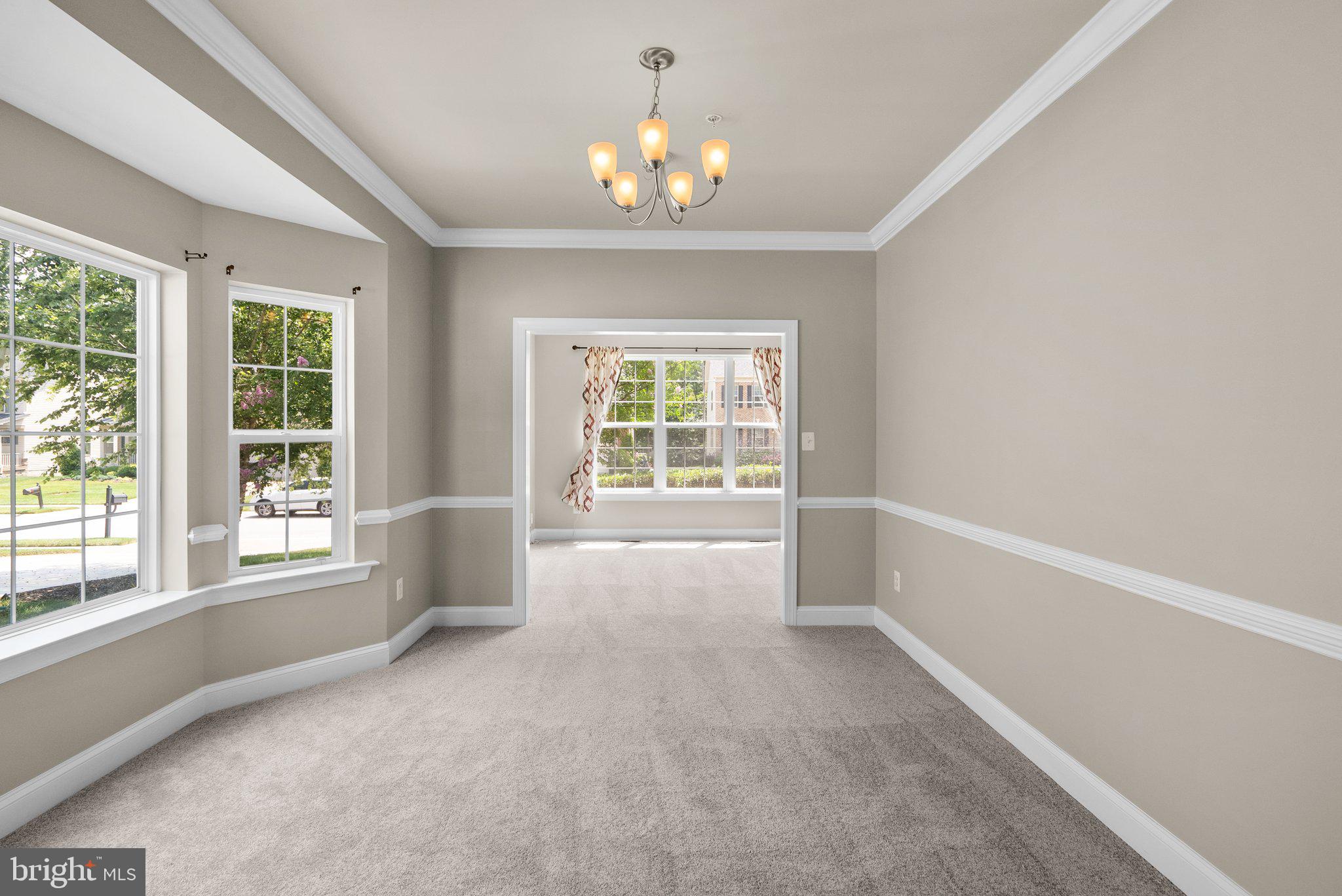 9602 Pep Rally Lane Waldorf, MD 20603 - Photo 7 of 44 wooden floor in an empty room with a window