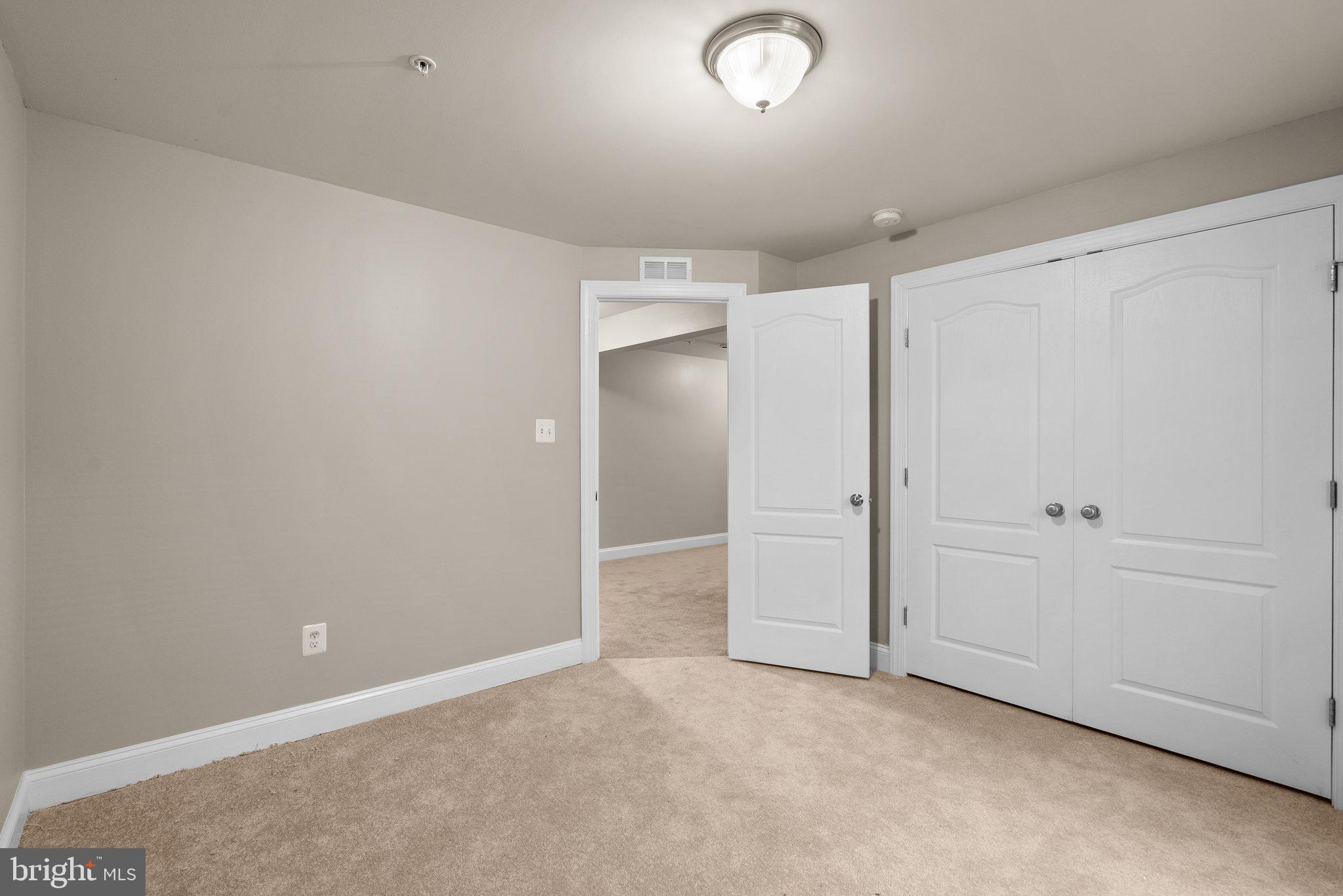 9602 Pep Rally Lane Waldorf, MD 20603 - Photo 8 of 44 an empty room with closet area