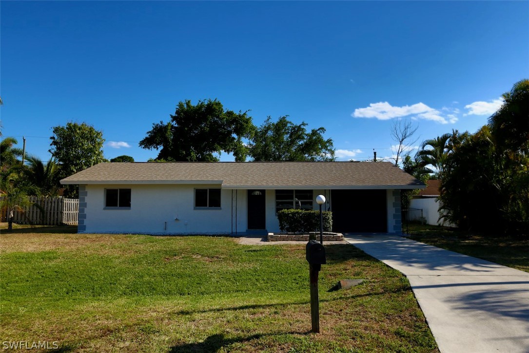 9196 Hamlin Road East Fort Myers, FL 33967 - Photo 1 of 19 a front view of house with yard and green space