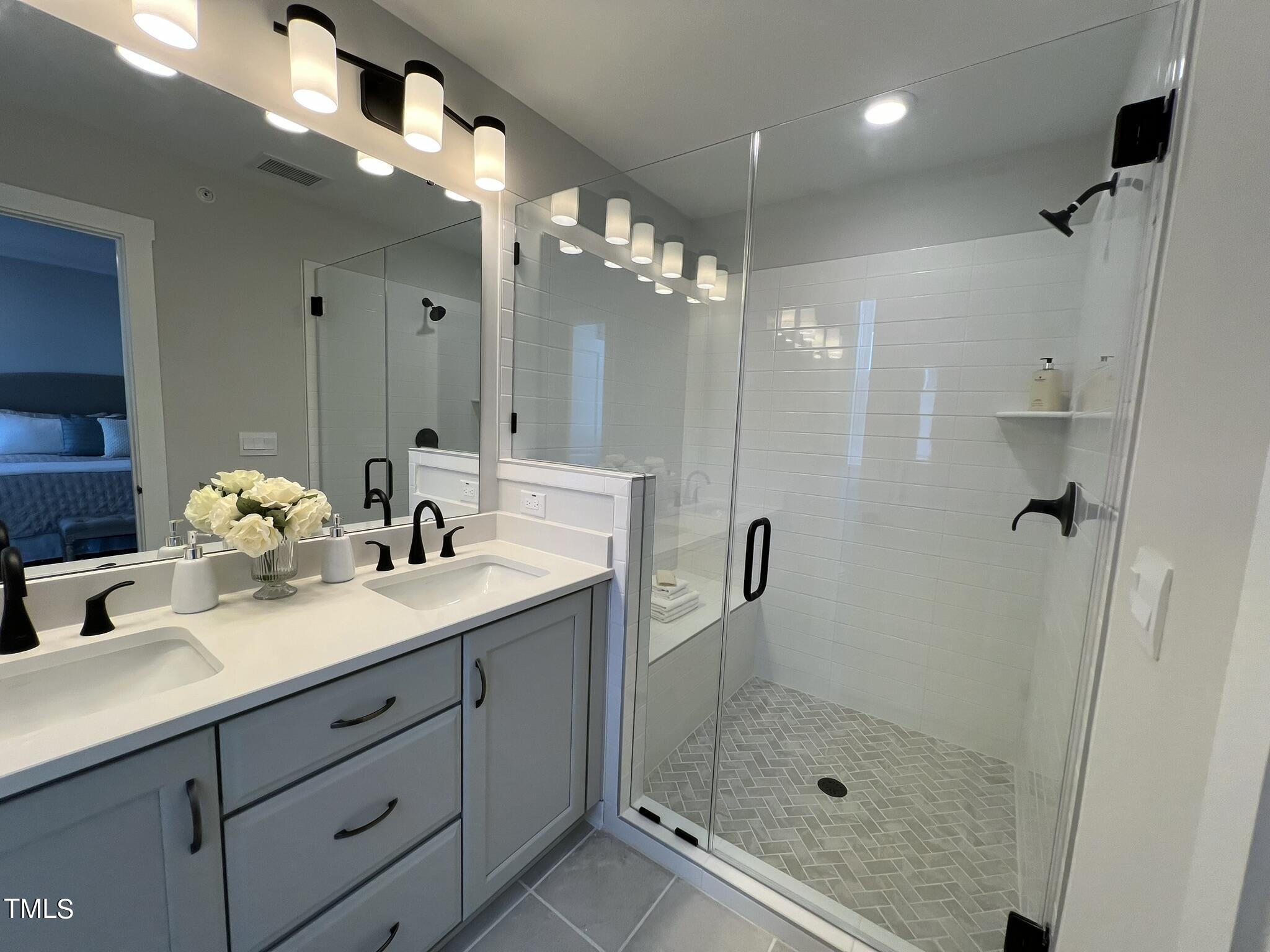 11549 Helmond Way, Unit 102 Raleigh, NC 27617 - Photo 29 of 52 Primary Bath
