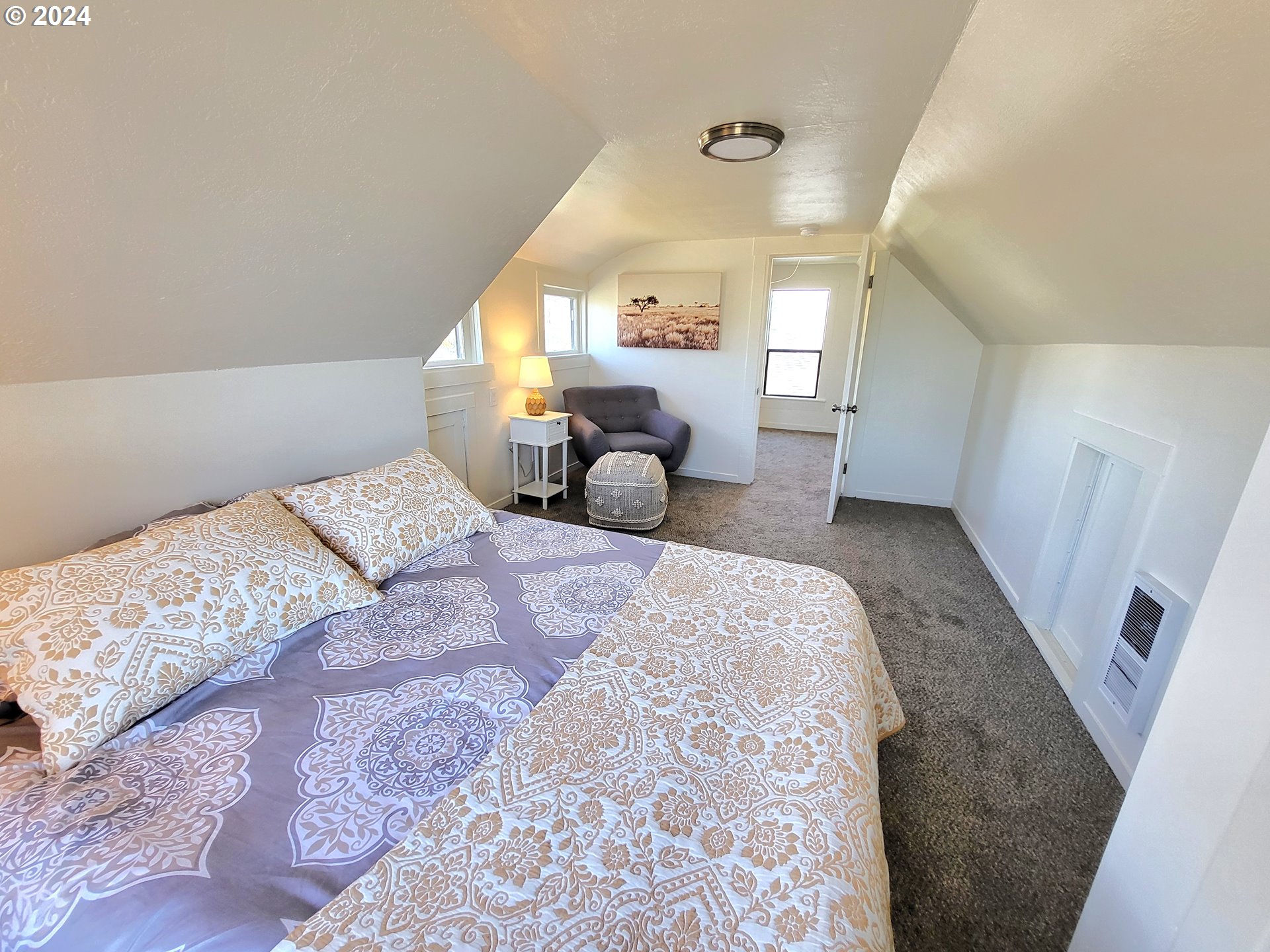 1029 A Street Springfield, OR 97477 - Photo 18 of 27 a bedroom with a bed and window