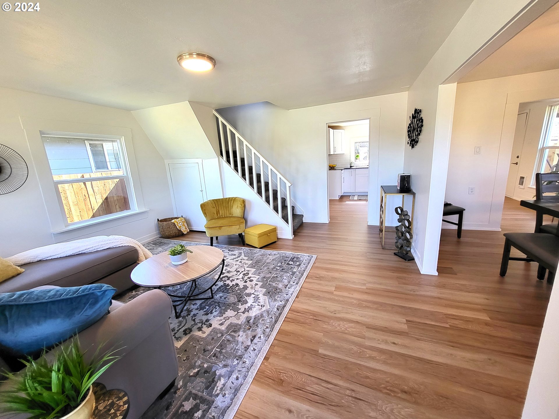 1029 A Street Springfield, OR 97477 - Photo 4 of 27 a living room with furniture and wooden floor