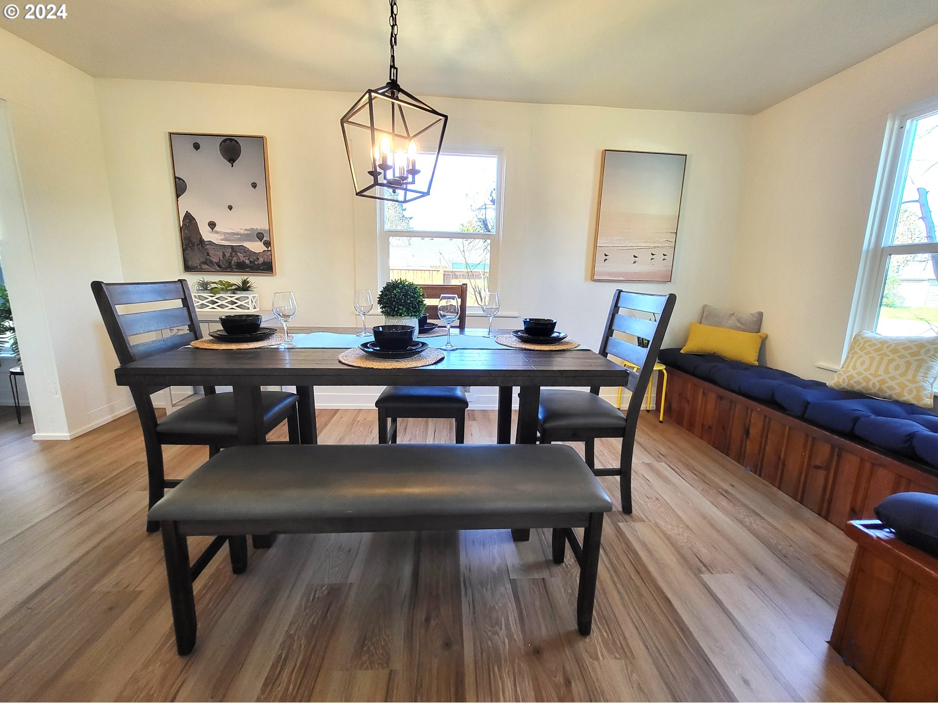 1029 A Street Springfield, OR 97477 - Photo 6 of 27 a view of a dining room with furniture window and wooden floor