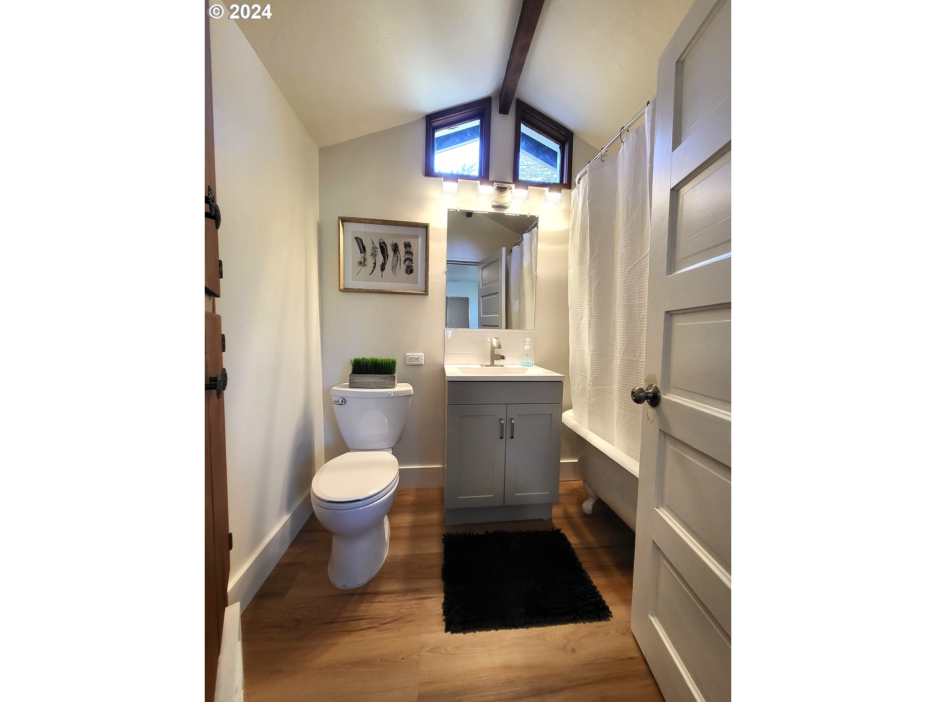 1029 A Street Springfield, OR 97477 - Photo 8 of 27 a bathroom with a sink and a toilet
