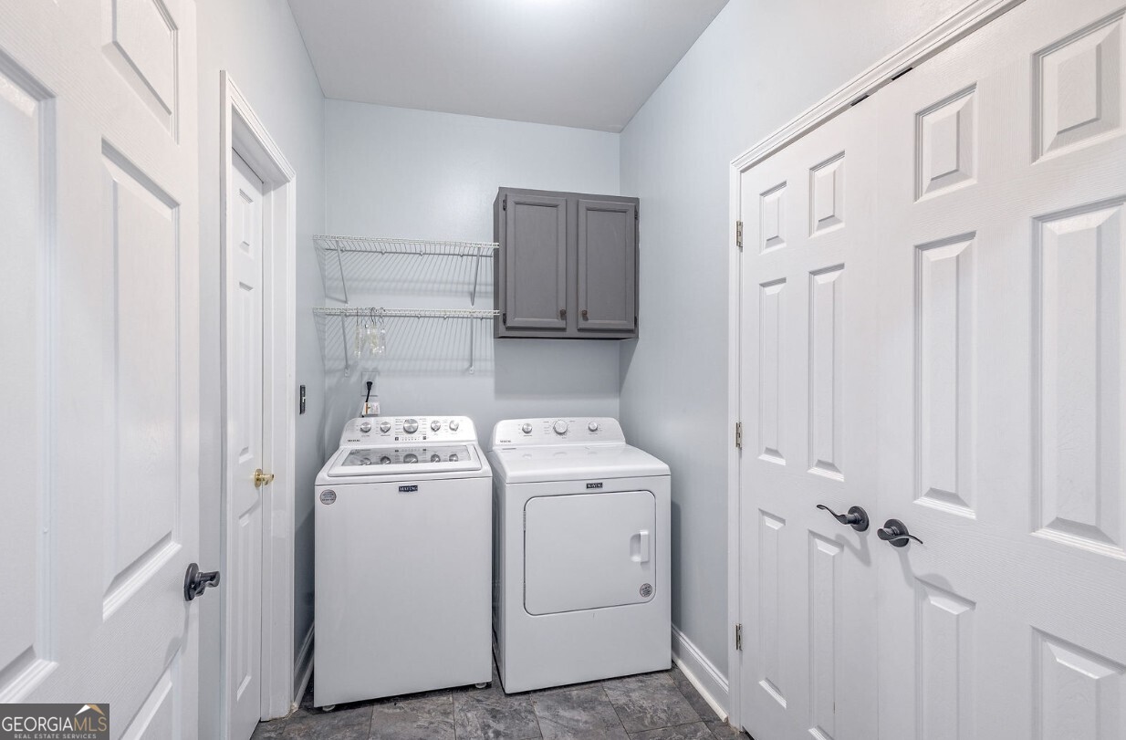 82 Newton Road LaGrange, GA 30240 - Photo 27 of 45 a view of a storage & utility room with dryer and washer