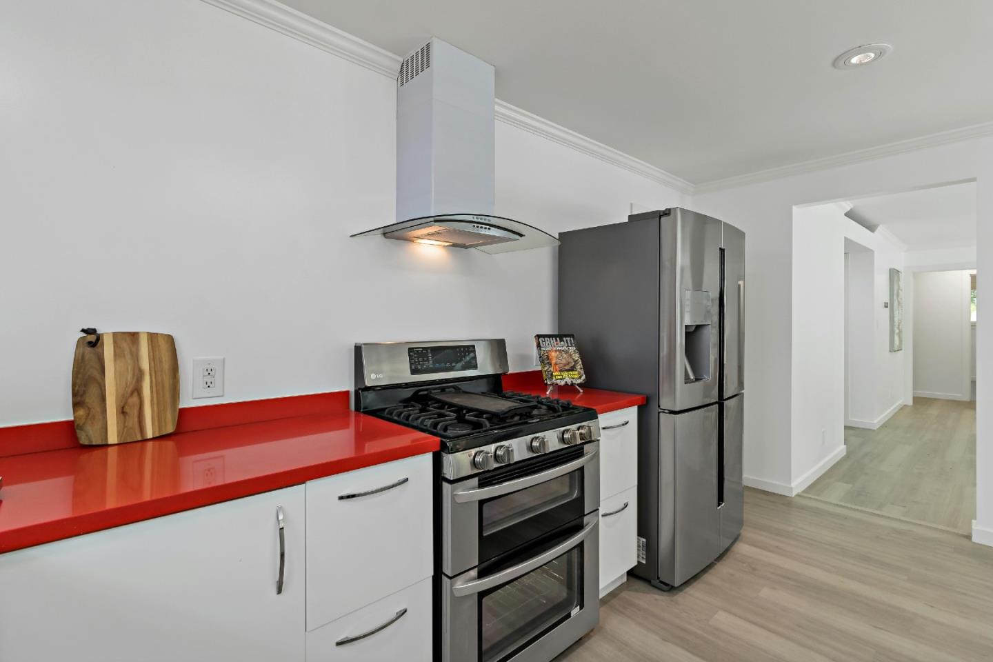 1502 Petersen Avenue San Jose, CA 95129 - Photo 13 of 56 a kitchen with stainless steel appliances a refrigerator and a stove top oven