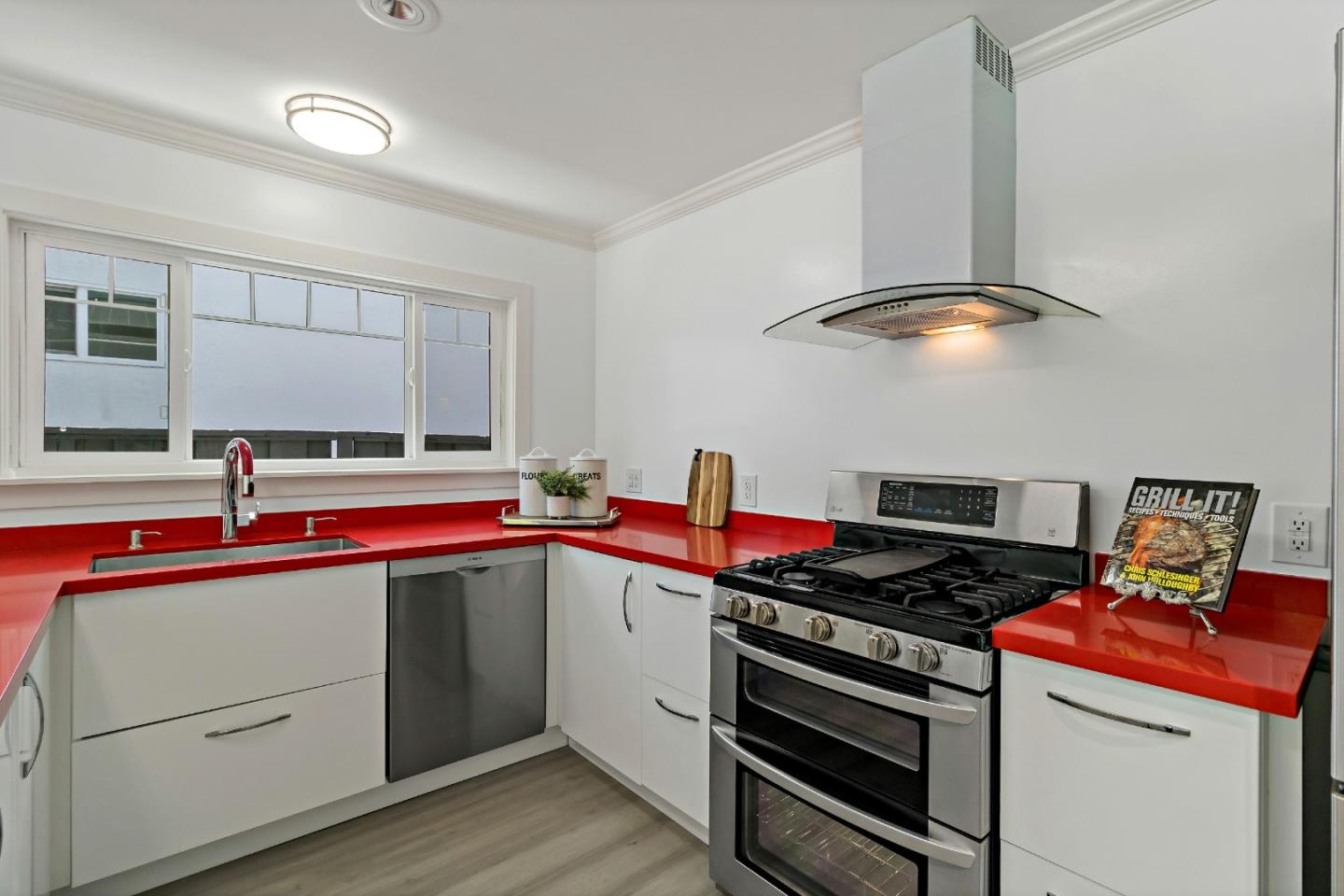 1502 Petersen Avenue San Jose, CA 95129 - Photo 14 of 56 a kitchen with a stove and a sink