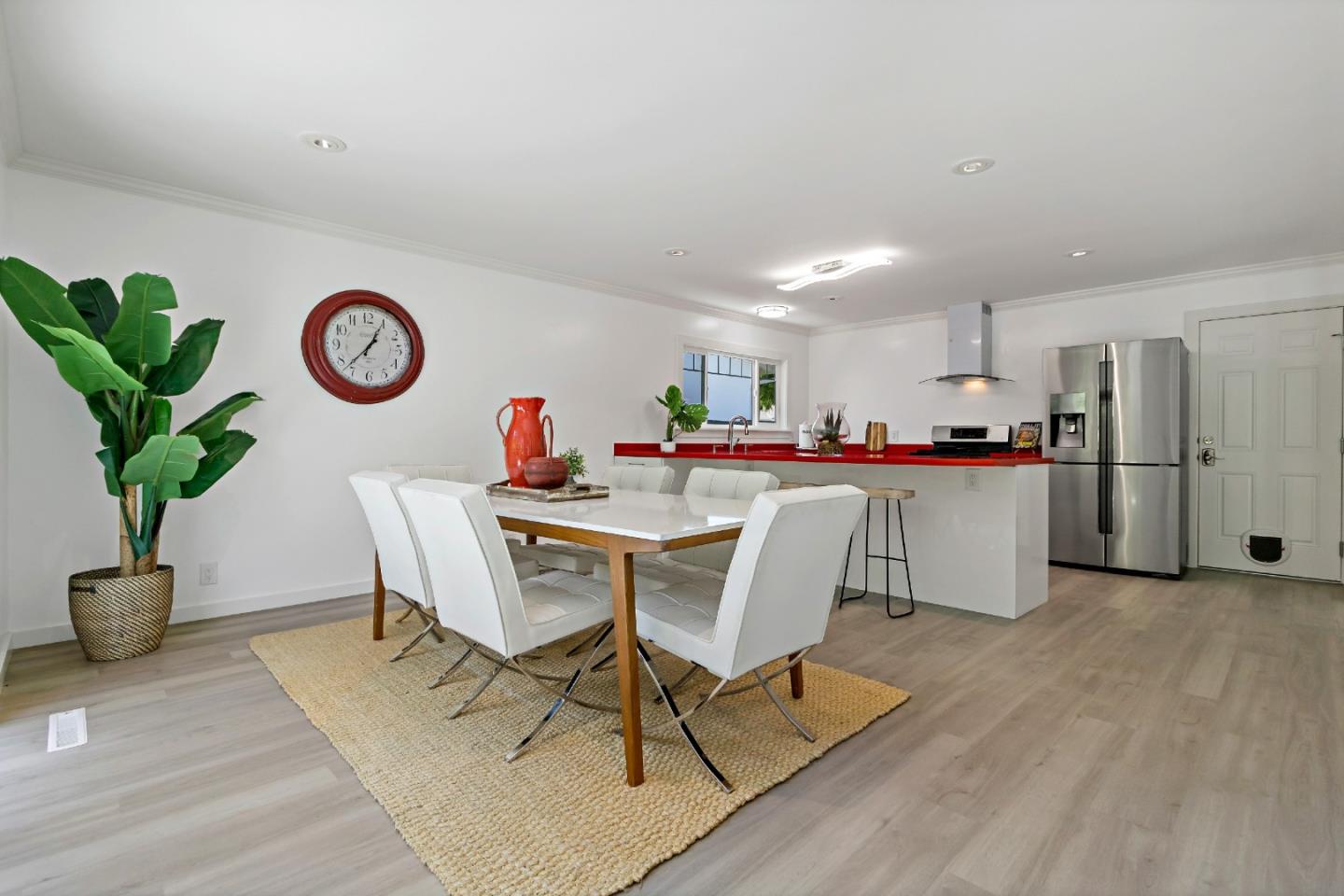 1502 Petersen Avenue San Jose, CA 95129 - Photo 16 of 56 a view of a dining room with furniture and a table