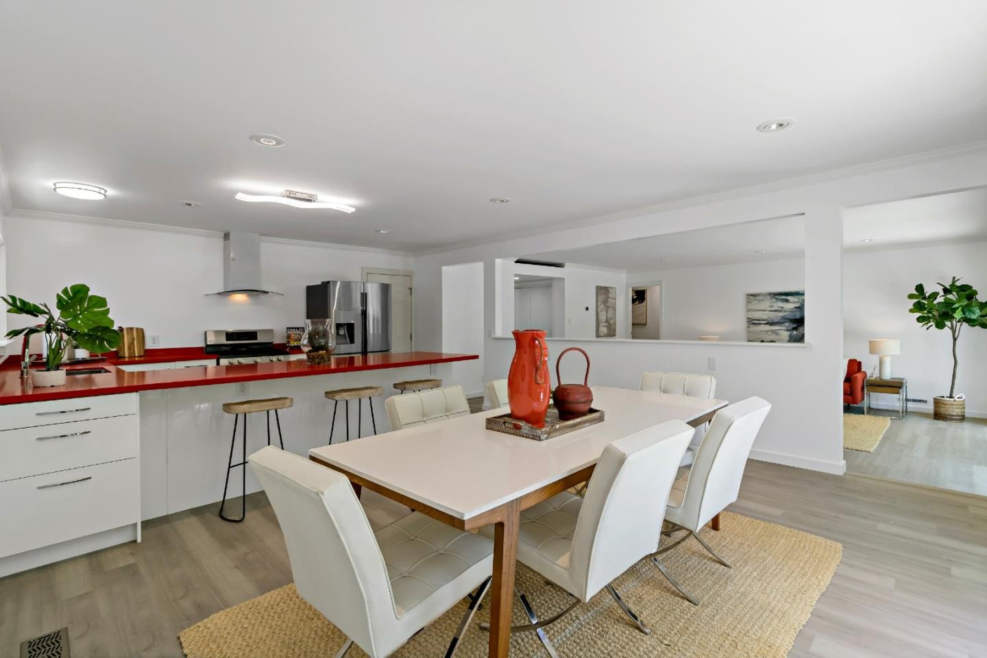 1502 Petersen Avenue San Jose, CA 95129 - Photo 18 of 56 a kitchen with a dining table chairs and view living room